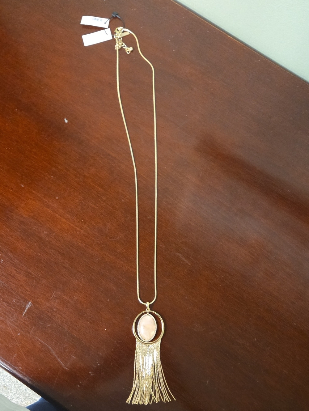 White House Black Market Gold-Tone Pendant Necklace with Peach Stone and Tassel
